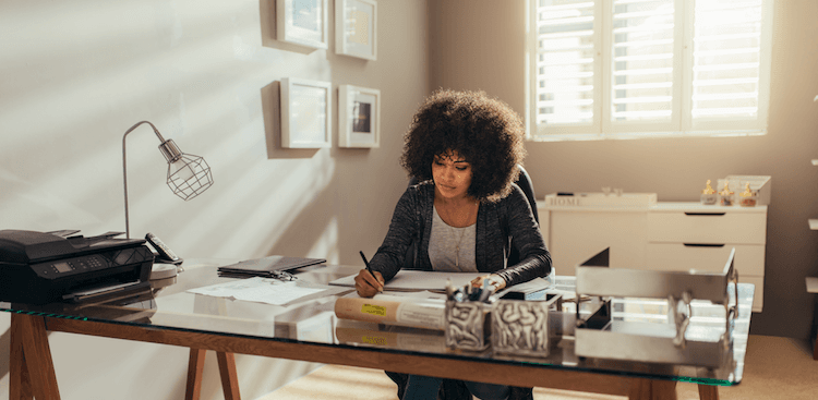 person working at a desk in a home office